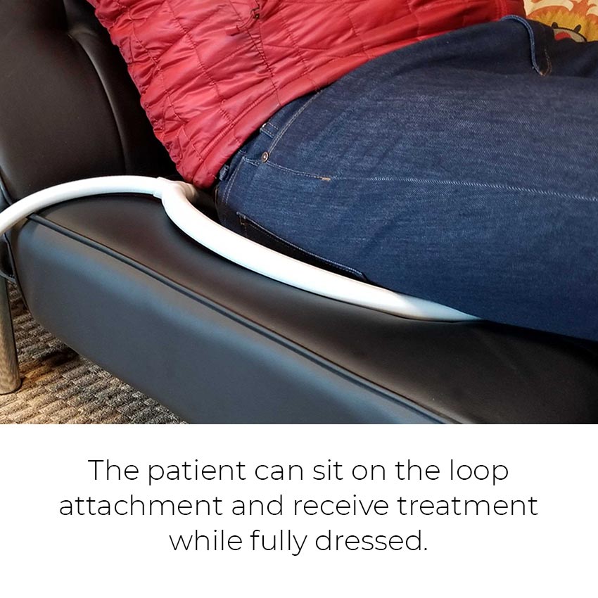 The patient can sit on the loop attachment and receive treatment while fully dressed.